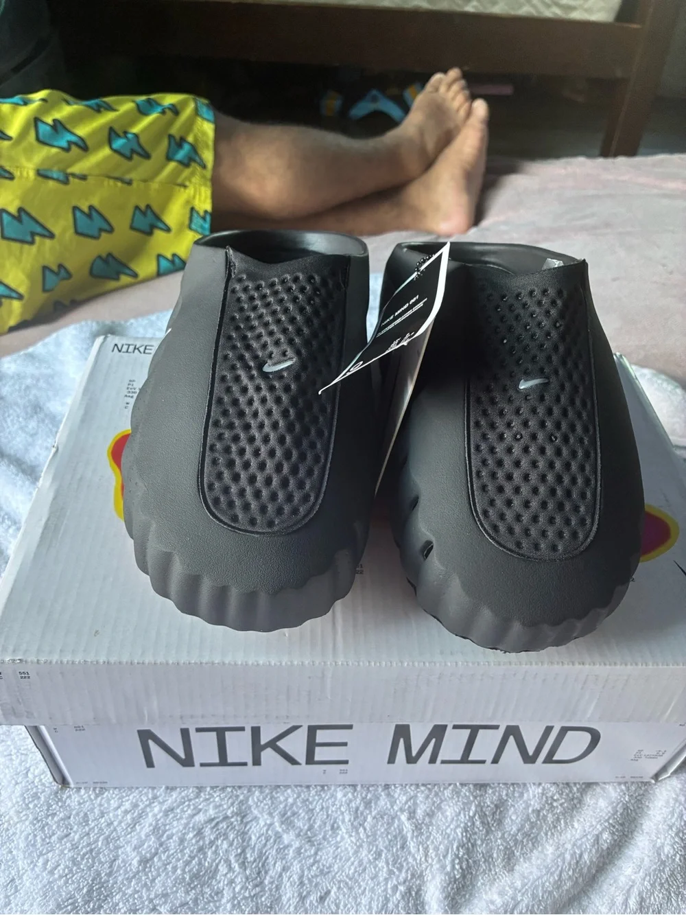 Nike Kids Black Slip-On Sandals with Bright Orange Traction Studs 9